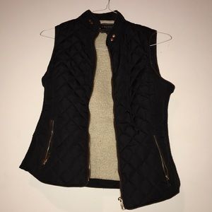 Black puffy vest